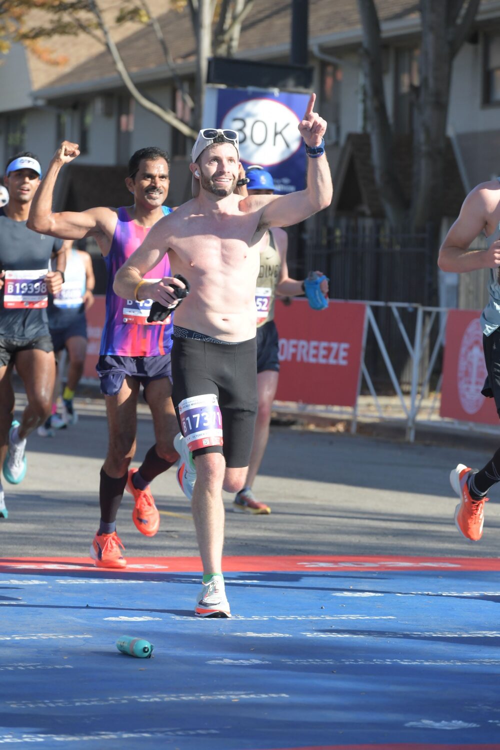 Murali Gaddam passes under a large 30K banner at the Chicago Marathon 2026.